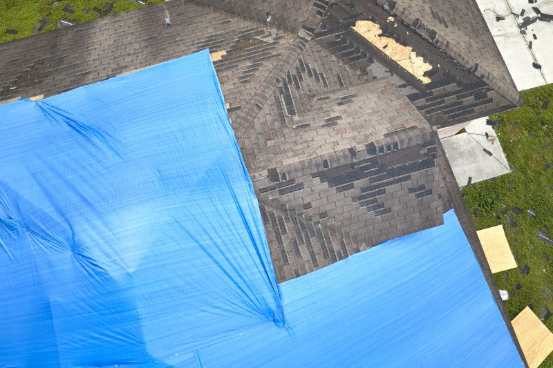 Storm Damage Roof Tarping in Grove City, PA